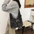 Vintage washed black denim shoulder bag for women with punk rivets and large buckle - Black