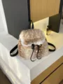 Cozy fawn print faux fur backpack featuring delicate white lace trim and black straps - Single Bag / Khaki