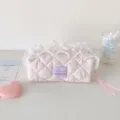 Detailed view of a cream pink quilted lace pencil case featuring a cute rabbit pattern - Pink Bunny Cosmetic Bag