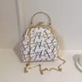 Elegant white shell bag with gold sequins, kiss-lock closure and gold chain strap for women - Gold