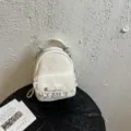 Mini mochila blanca para mujer con estampado de leopardo, borde de encaje y detalle de lazo - Estilo de Bolsa Única / Blanco Roto