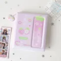 Detailed view of a pink strawberry-themed PVC photo album featuring a cute matching pendant charm - Sweet Strawberry Style / Pink