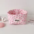 Close-up of pink checkered strawberry pattern fabric storage basket for desk details - Strawberry Plaid Style / Red