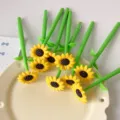 Detailed view of creative sunflower-shaped silicone gel pens on a decorative plate - Sunflower Style / 1PC / Yellow-Green