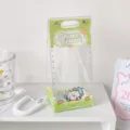 Bolsa transparente de PVC para muñecos con cuadros verdes e ilustración de gato panadero. - Estilo Compartir Pan / Verde
