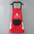 Waterproof kitchen apron for women, cute cartoon rabbit print with handy pockets and towels. - Red Apron with Black Pocket & Hand-Wipe