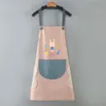 Grembiule da cucina impermeabile con simpatico motivo di coniglio, tasche e salviette laterali. - Rosa antico con tasca blu (modello asciugamani)