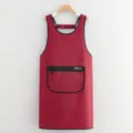 Red waterproof work apron with zipper pocket and stylish black trim for kitchen cooking. - Dark Red