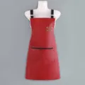 Red waterproof PU leather apron for kitchen cooking and work, stylish solid color design. - Red