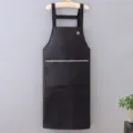 Solid color waterproof and oil-proof kitchen apron with pockets, durable cooking apron for daily use. - Black