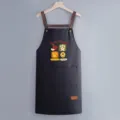 Stylish black kitchen apron with cute print and pocket, comfortable waterproof design. - Regular Fit / Black