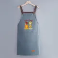 Waterproof kitchen apron with cute printed design and handy front pocket for cooking. - Regular Fit / Leather Blue