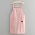 Solid color nylon summer lightweight waterproof apron with dual pockets for cooking work use - Light Pink