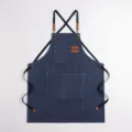 Stilvolle Jeans Arbeits-Schürze mit Kreuzgurten und Taschen für Küche, Restaurant und Café. - Blau