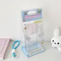 Detail showing the transparent PVC material and blue angel wing pattern of a doll display bag - Blue