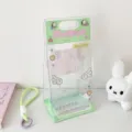 Clear PVC plush doll display bag with angel wings and cute graphics for 10cm dolls - Green