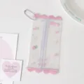 Close-up view of a clear PVC mini doll storage bag with pink accents and bead chain - Pink