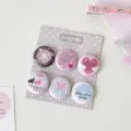 Close-up view of six cute 25mm mini badges with sweet heart and angel designs in pastel pink - 6 Pieces/Set / Gray