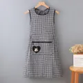 Black and white checkered kitchen apron with cute rabbit zipper pocket, breathable style. - Black