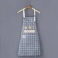 Grembule da cucina impermeabile a quadri con tasca grafica e spallacci regolabili. - Vestibilità regolare / Blu cuoio