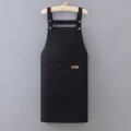 Grembiule da lavoro nero in misto cotone con tasca frontale e comode bretelle regolabili. - Stile Bretelle / Nero