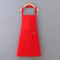 Solid red kitchen work apron with front pocket and adjustable straps for cooking cleaning. - Neck Lanyard / Red
