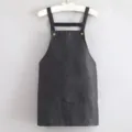Black kitchen apron with cross back straps and pockets, comfortable daily cooking wear. - Black With Straps