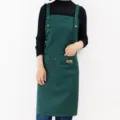 Dark green work apron for men and women, stylish canvas kitchen apron with pockets and snaps. - Suspender Style / Green