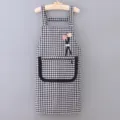 Black and white plaid kitchen apron for women, cotton material with front pocket and cute flower. - Black