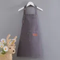 Dark grey canvas children apron with pocket, adjustable neck strap and stylish contrast stitching. - Gray