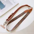 Detailed view of the retro woven geometric phone strap with metal clips and adjustable rope. - Style #6