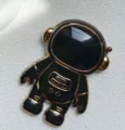 Schwarz gold Astronaut Handyhalter, kreative 3D Cartoon Klebe Ring Ständer für Smartphones. - Schwarz
