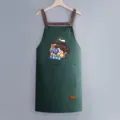 Waterproof kitchen apron with cute cartoon graphic, oil-resistant cooking workwear with pockets. - Regular Fit / Dark Green