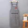 Women's black and white plaid cotton kitchen cooking apron with zipper pocket and cute bear design. - Black