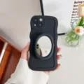 Black liquid silicone wavy iPhone case featuring a built-in oval makeup mirror stand. - Solid Color Wavy Makeup Mirror - Black / iPhone 14 Pro Max