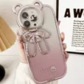 Schattige beren iPhone hoesje met roze glitter en standaard, luxe telefoonhoes volledige dekking. - Beer cameralensstandaard (Verloop roze) / 15promax