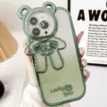 Cute green glitter bear phone case with stand for iPhone 15 Pro Max full cover design - Bear Camera Lens Stand (Glitter Green)