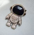 Niedlicher 3D-Cartoon-Astronaut-Telefonhalter mit Goldrand, kreativer Klebe-Ringständer. - Rosa