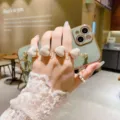 Plush heart bracelet phone case with gold electroplated frame and fluffy love charm chain. - Samsung S22 / Light Green