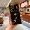 Luxurious black electroplated phone case with stylish gold heart chain strap for Samsung Galaxy. - A12/M12/F12 / Classic Black