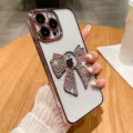 Gegalvaniseerde zachte telefoonhoes met strass-strik en lensbescherming voor iPhone - Roze
