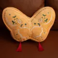 Yellow butterfly shaped plush pillow with intricate embroidery and red tassels for home decor. - Chinese Style Tassel Butterfly - Yellow (Removable & Washable Inner)