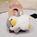 Cute penguin shoulder plush toy with magnetic design, soft stuffed animal companion for clothing. - Penguin