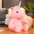 Lindo peluche de unicornio rosa luminoso muñeca suave como regalo para niños. - Postura Sentada / Altura Sentado 25cm / Rosa
