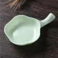 Green wheat straw sauce dish with handle for dining, compact seasoning plate for kitchen table. - Nordic Green