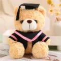 Süßes Plüschtier Abschluss Teddybär mit Doktorhut und Robe als perfektes Geschenk. - Hellbraun-Rosa Streifen / 23cm