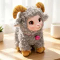Cute plush sheep keychain toy with vinyl face, fluffy grey fleece, and pink bell pendant. - Grey Sitting