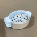 Plastic multi-functional egg slicer kitchen tool with blue and grey design for quick cutting. - Blue