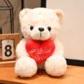 Süßer beiger Plüsch-Teddybär mit rotem Kissen in Herzform, weiches Stofftier als Geschenk. - Weißer Bär mit Herz / 16cm