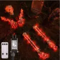 Detailansicht der Halloween Skelett Deko mit roten LEDs, Fernbedienung und Netzstecker - Fernbedienung Rotes Licht 5er Set